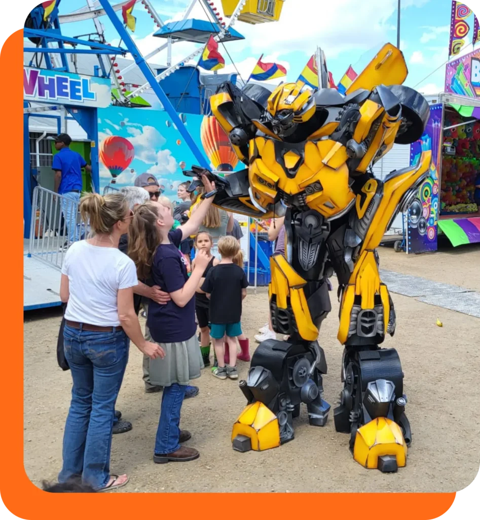 Mother and daughter greeting the transformer robot, Pink Fun Rentals, Winnipeg and Kelowna - Transformer Robot